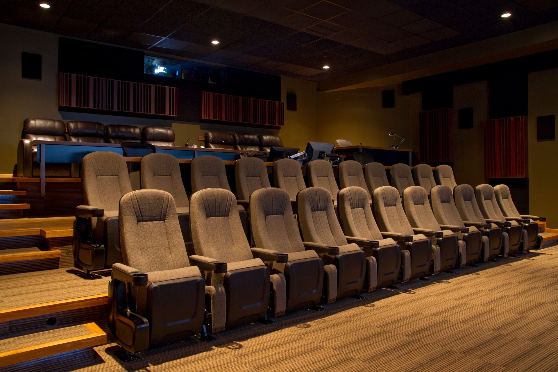 Theater 1 seating facing the 24 by 10 foot screen at Light Iron